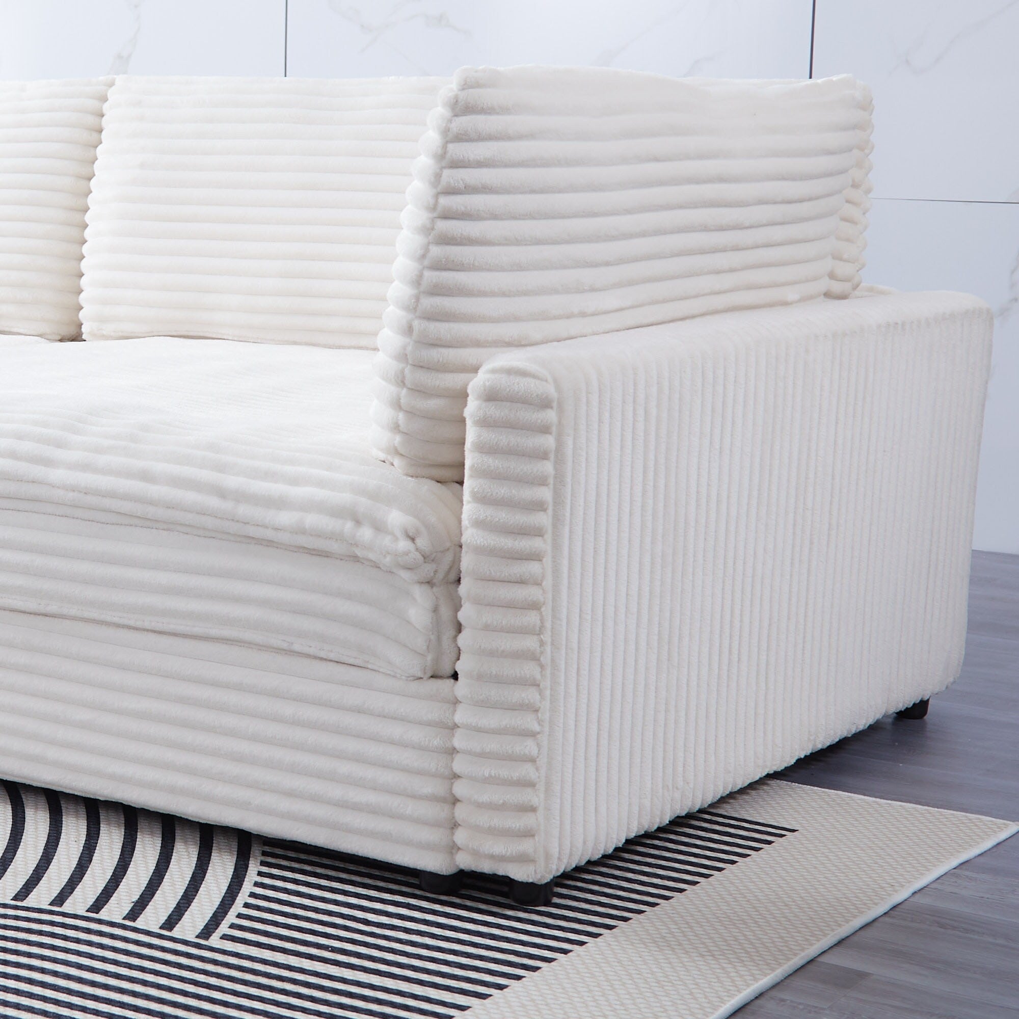 112-inch black corduroy sofa: two throw pillows, four backrests, opening up a new style for the living room's casual area