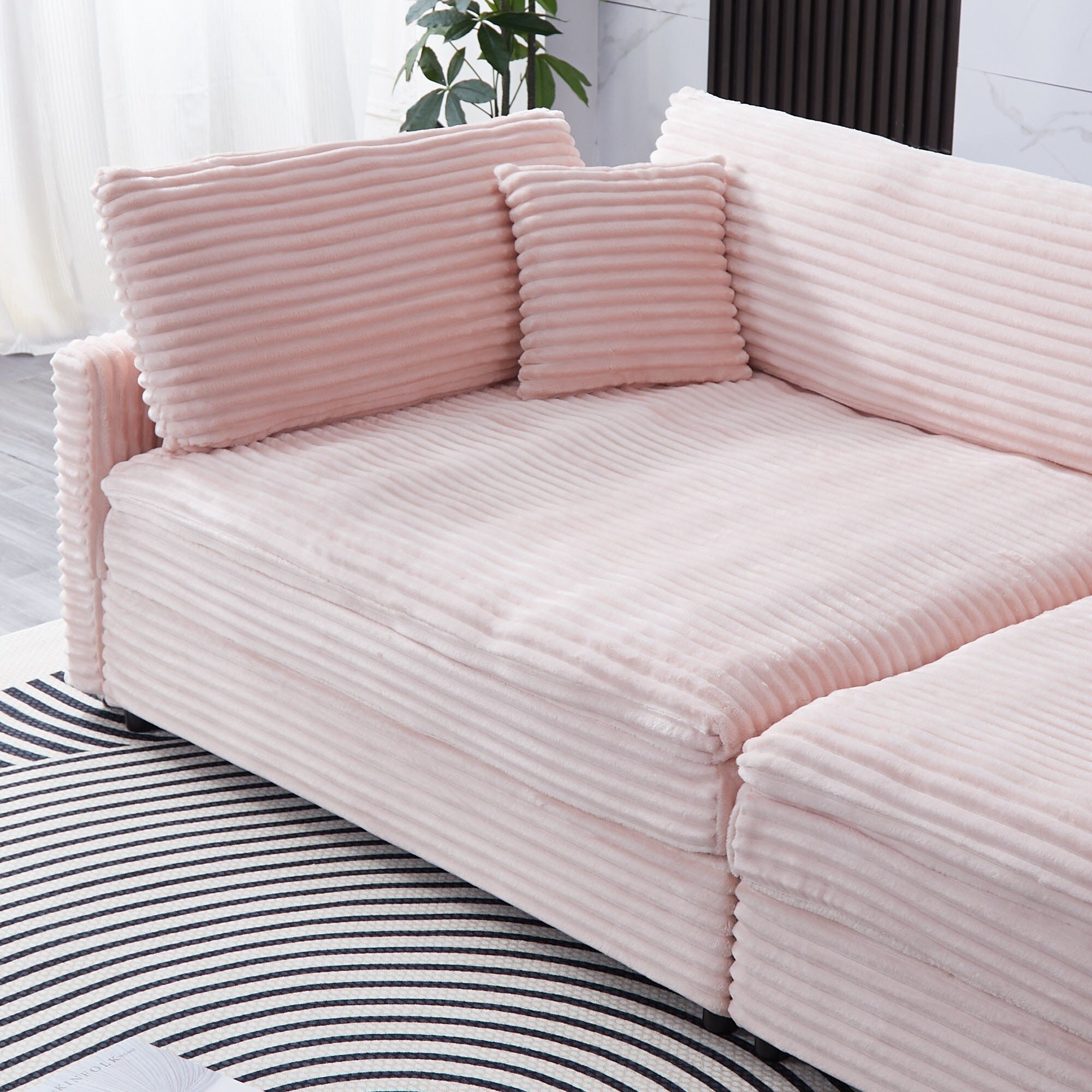 112-inch black corduroy sofa: two throw pillows, four backrests, opening up a new style for the living room's casual area