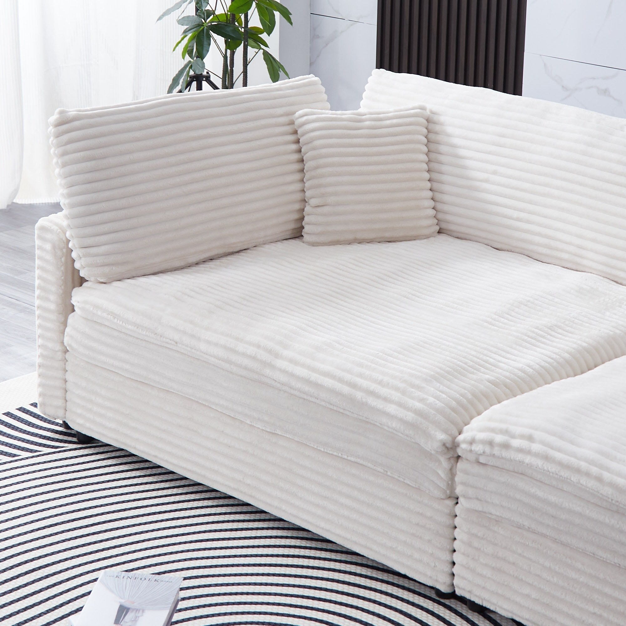 112-inch black corduroy sofa: two throw pillows, four backrests, opening up a new style for the living room's casual area