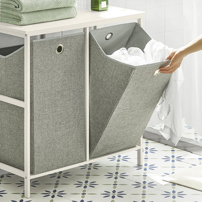 Armoire à linge SoBuy BZR57-W avec 2 paniers à linge amovibles et étagère de rangement pour salle de bain.