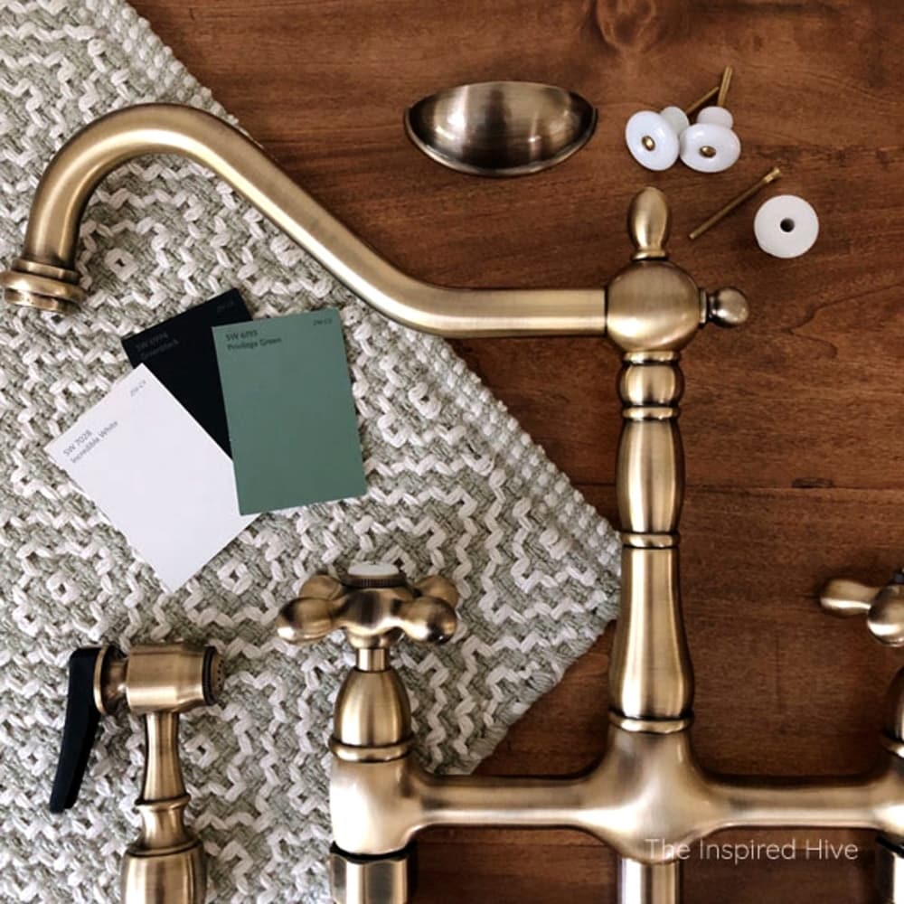 Kingston Brass Heritage Bridge Kitchen Faucet with Brass Sprayer