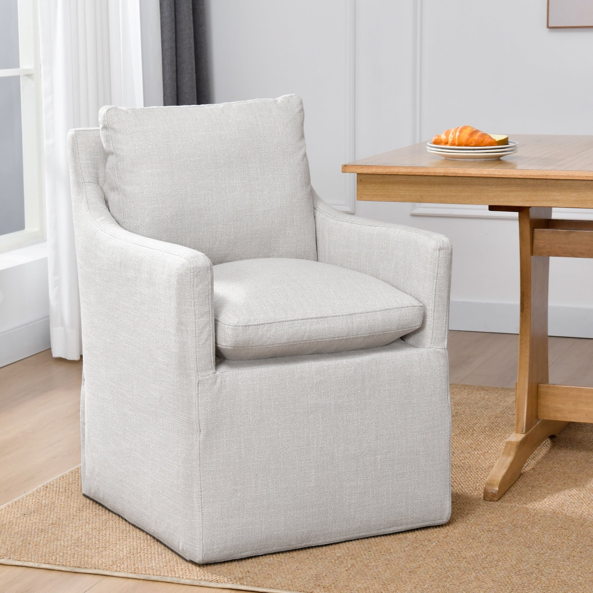 Upholstered Swiveling Rolling Linen Dining Chair